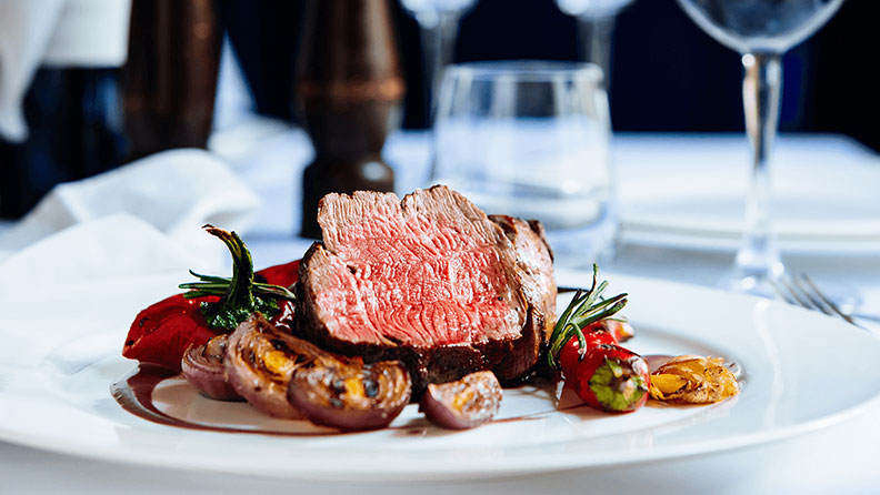 steak and potatoes while fine dining